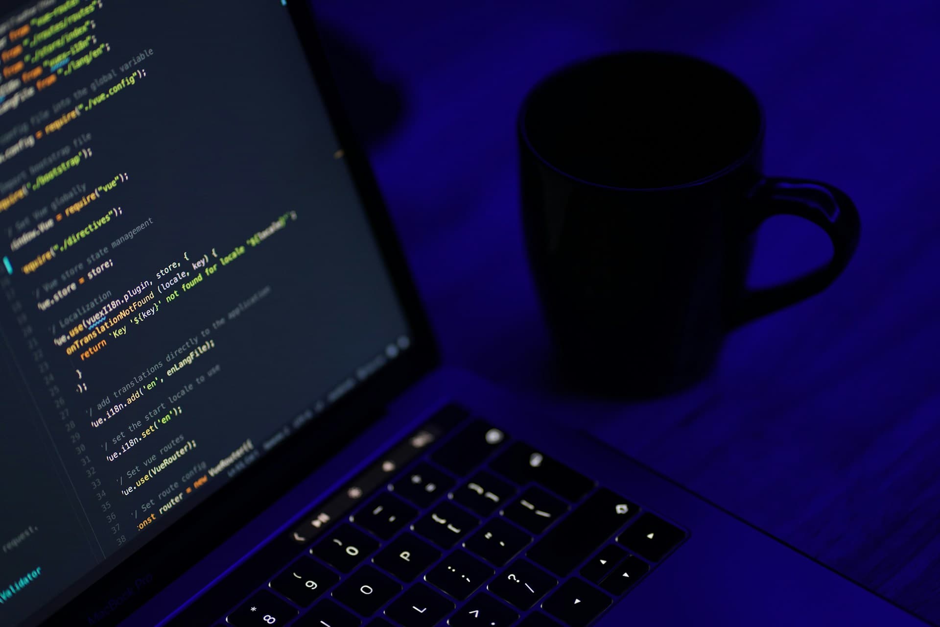Developer pairing with an AI coding assistant in a modern IDE with suggestions appearing inline